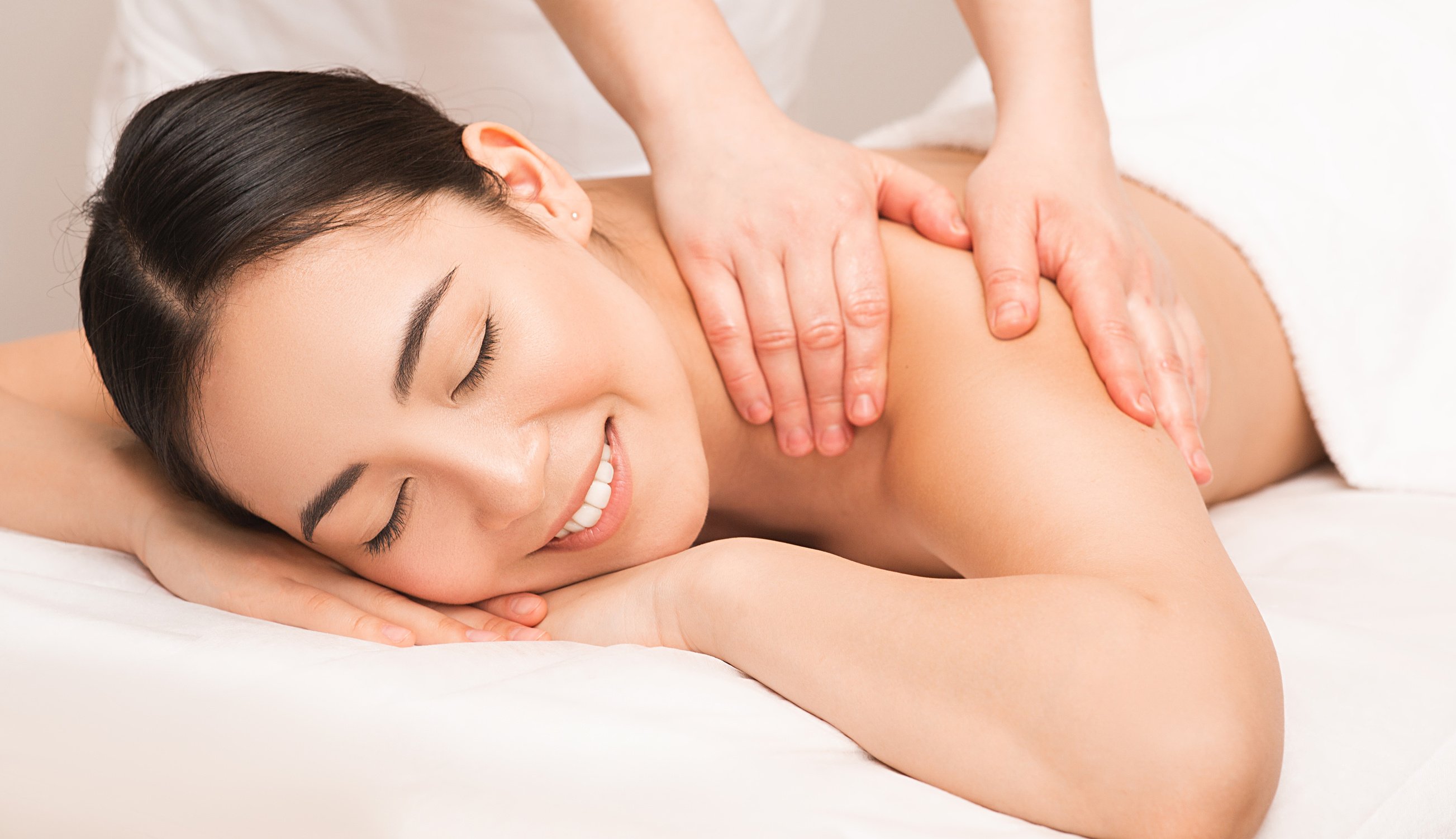 Thai Massage therapy. Portrait asian woman enjoying massage at the spa.